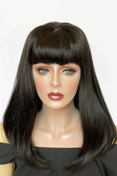 Black 1960s style wig with a high crown: Cathy